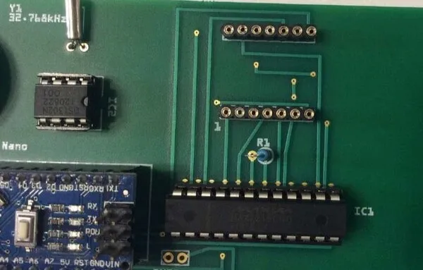 Insert the two ICs into their corresponding sockets. Pay attention to their orientation.