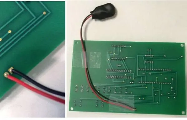 If using 9V battery: Solder the 9V battery snap to the back of the PCB. The black wire should be in the square pad. Then, attach the wires to the board with tape.